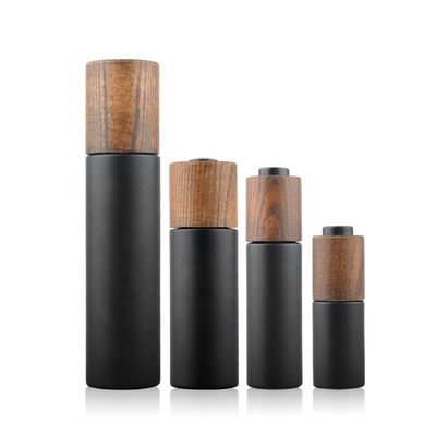 New Developed Wooden Bamboo Cap Round Dark Violet Glass Bottle with lotion pump