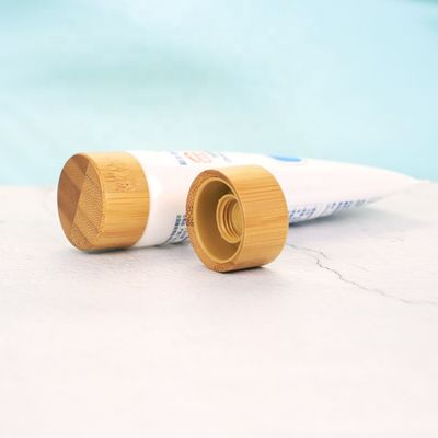 ISO2000 Hot Selling Bamboo Screw Cap Lid Custom Cosmetic Bamboo Cap For Tube