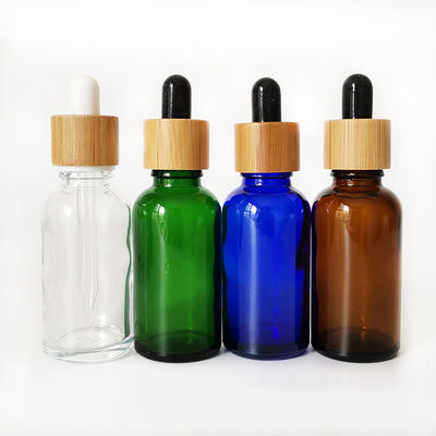 Glass Essential Oil Bottle With Bamboo Child Resistant Dropper Small oil bottle