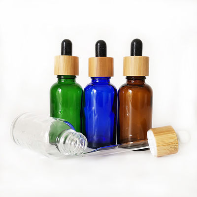 Glass Essential Oil Bottle With Bamboo Child Resistant Dropper Small oil bottle